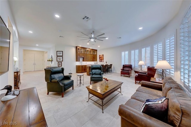 living room with ceiling fan