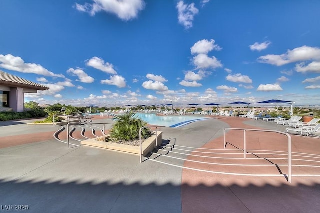 view of swimming pool featuring a patio