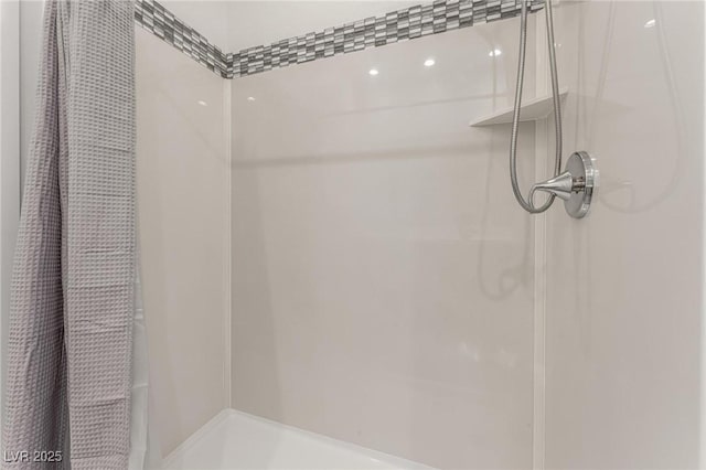 bathroom featuring a shower