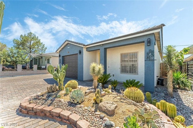 ranch-style home with a garage