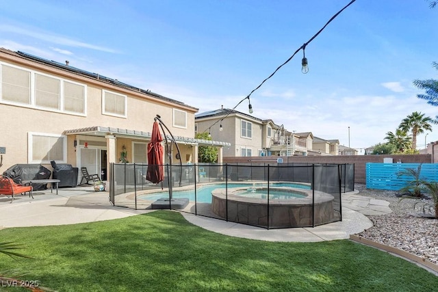 view of swimming pool featuring a yard, a fenced backyard, a patio, and an in ground hot tub