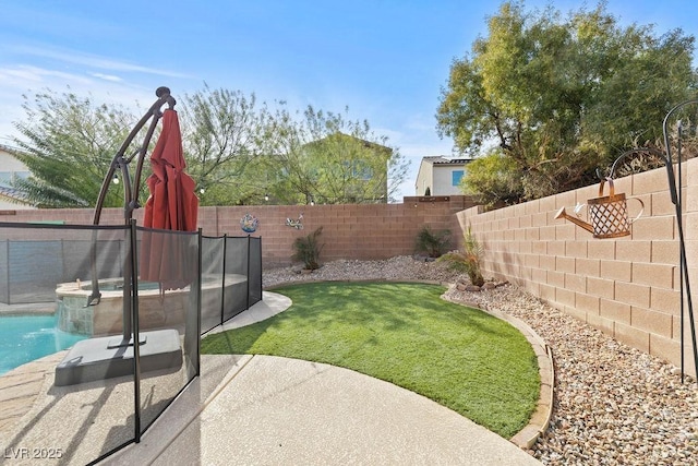 view of yard featuring a fenced backyard and a fenced in pool