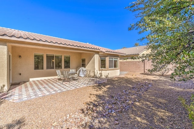 back of house featuring a patio