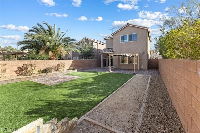 back of house featuring a patio area, a fenced backyard, a tile roof, and stucco siding