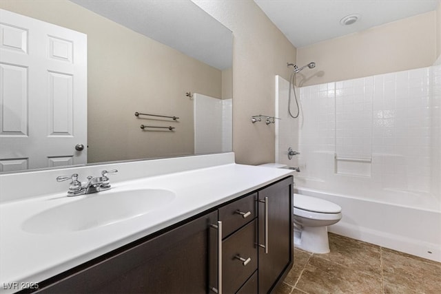 full bathroom with shower / bath combination, vanity, and toilet