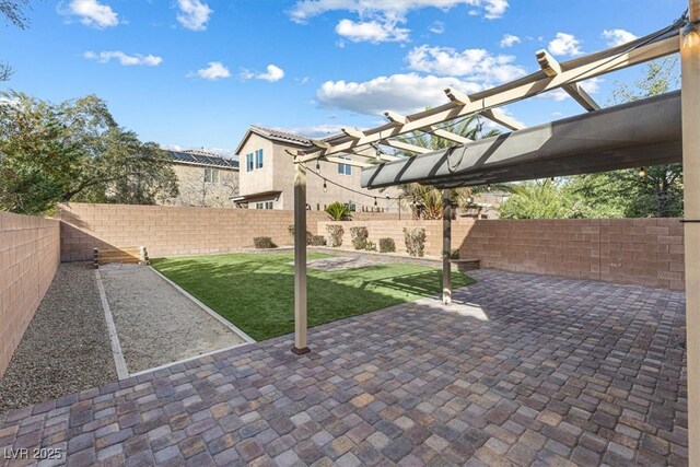 view of patio with a fenced backyard and a pergola