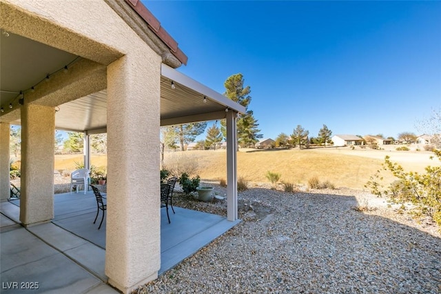 view of yard with a patio area