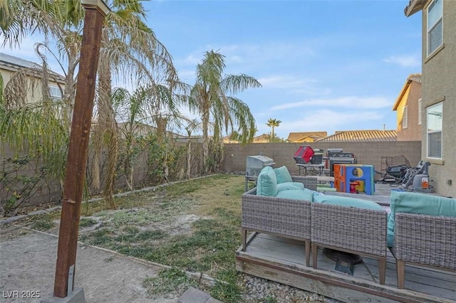 view of yard featuring an outdoor living space and a patio