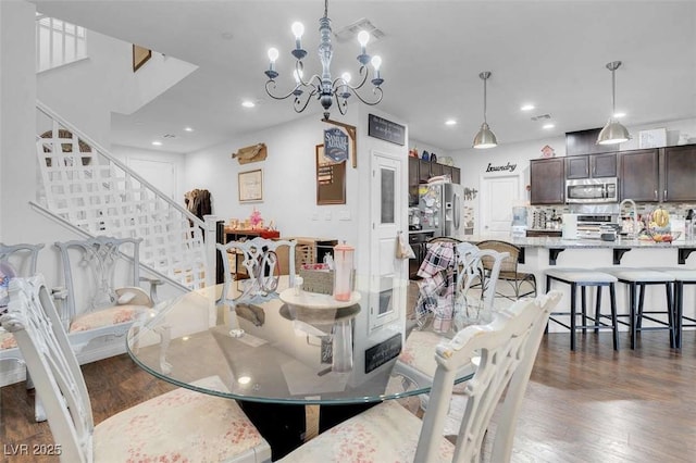 dining area featuring dark hardwood / wood-style flooring