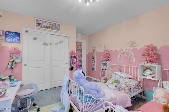 bedroom with carpet floors and a closet