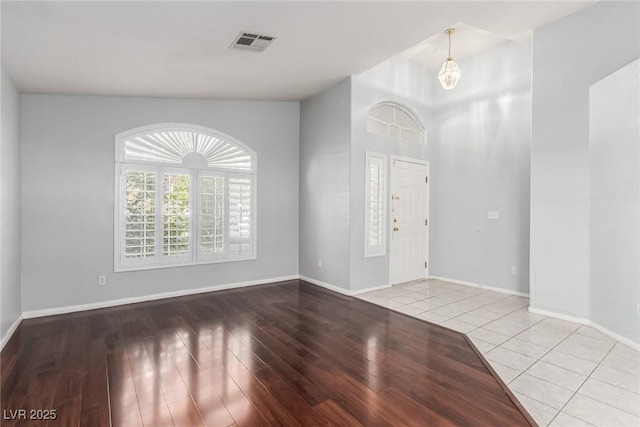 entryway with light hardwood / wood-style flooring