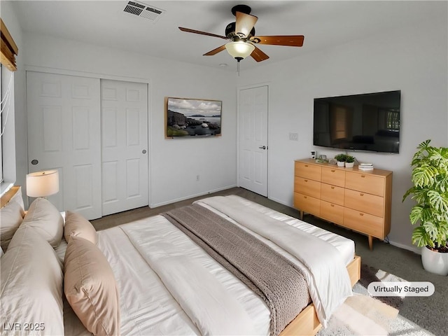 bedroom featuring ceiling fan and a closet