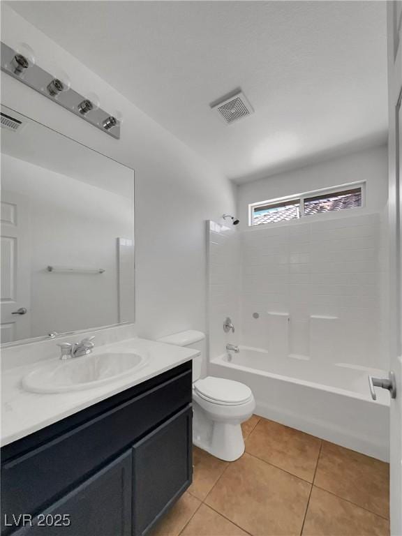 full bathroom with tile patterned flooring, shower / tub combination, vanity, and toilet