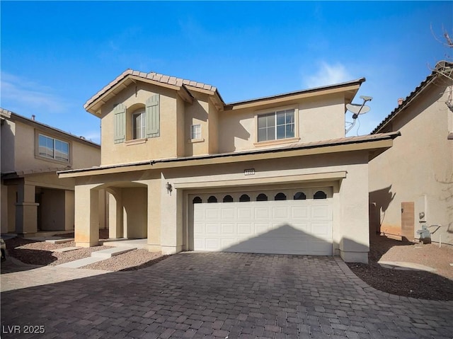 view of front of property featuring a garage