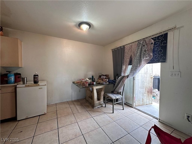 office area with light tile patterned floors