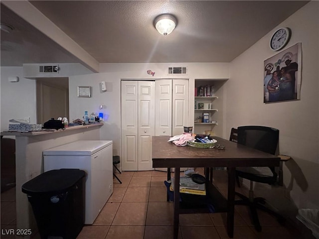 dining room featuring light tile patterned floors