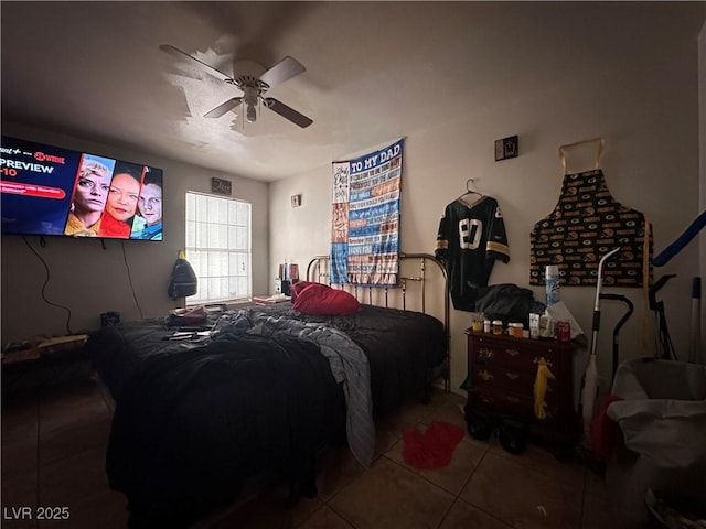 bedroom with tile patterned flooring and ceiling fan