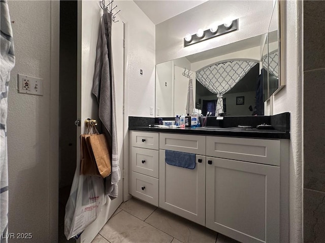 bathroom featuring vanity and tile patterned floors