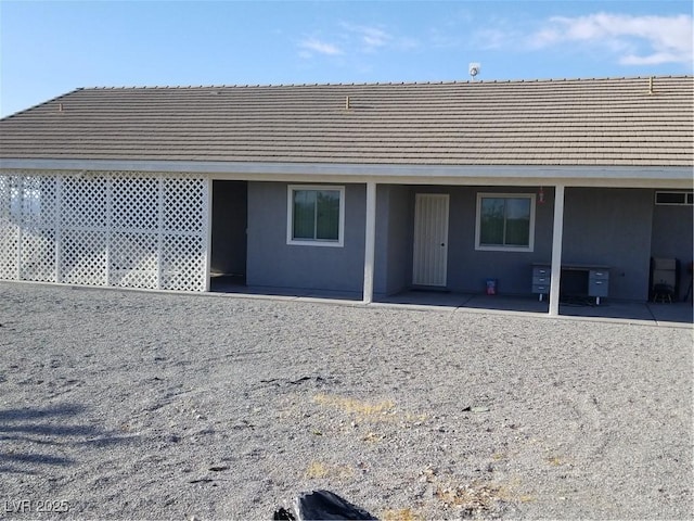 back of house featuring a patio