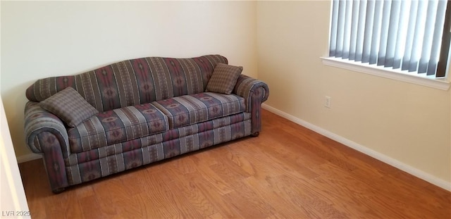 sitting room featuring light hardwood / wood-style floors