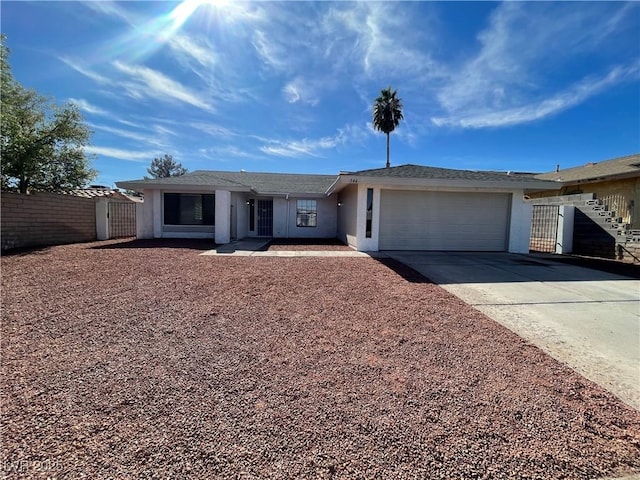 single story home with a garage