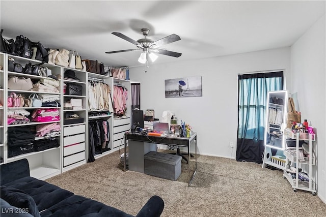 home office featuring carpet floors and ceiling fan