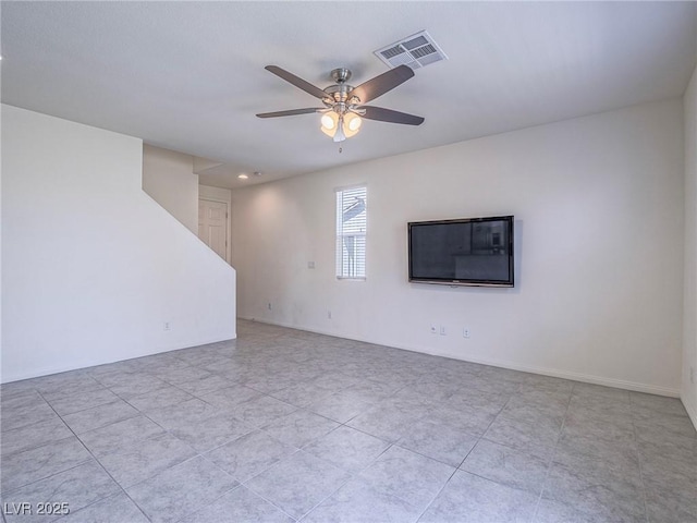 unfurnished living room featuring ceiling fan