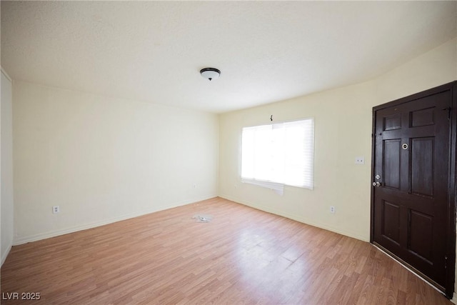 foyer with light wood-type flooring