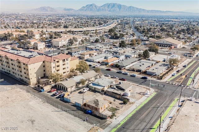 bird's eye view with a mountain view