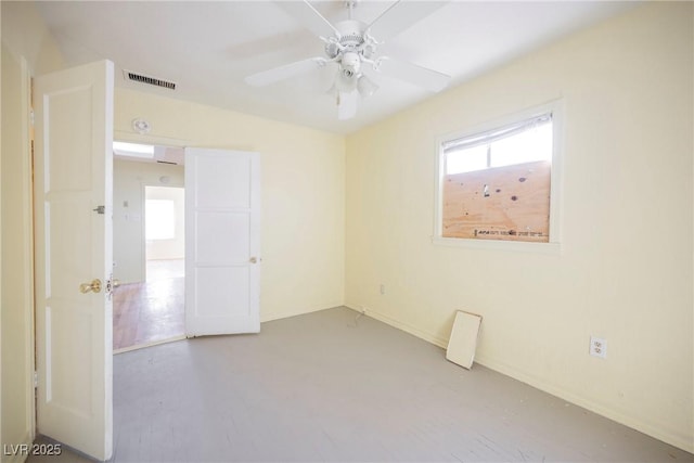 unfurnished room with ceiling fan