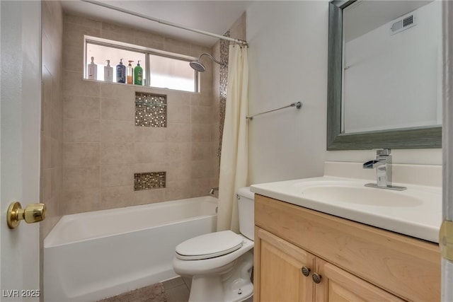 full bathroom featuring vanity, shower / bathtub combination with curtain, and toilet