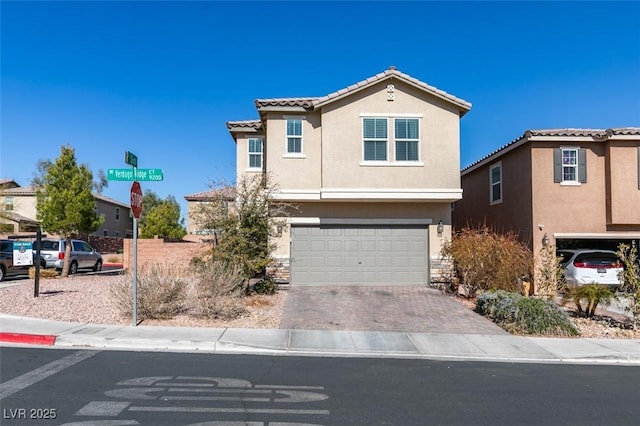 view of front of home with a garage