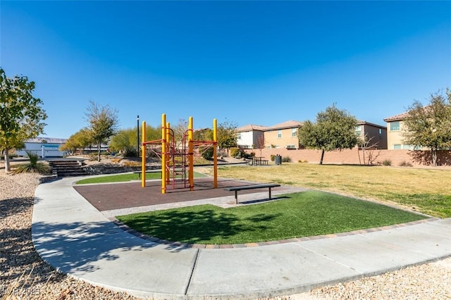 view of playground with a yard