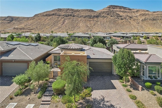 property view of mountains featuring a residential view