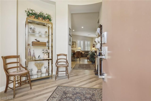 foyer with recessed lighting and wood finished floors