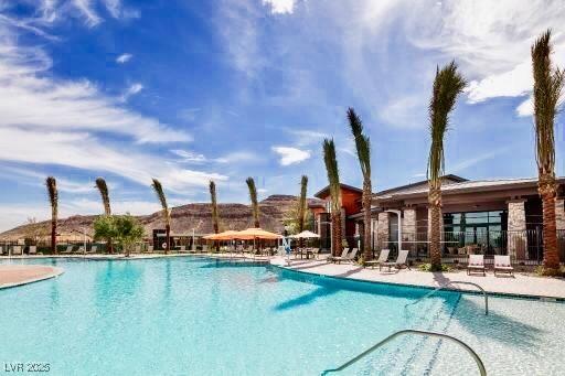 pool featuring a patio area