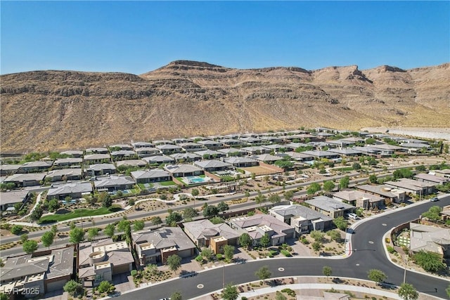 aerial view featuring a mountain view and a residential view