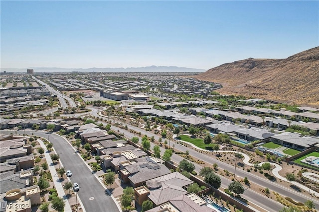 aerial view featuring a mountain view and a residential view