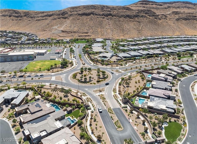 aerial view featuring a mountain view and a residential view