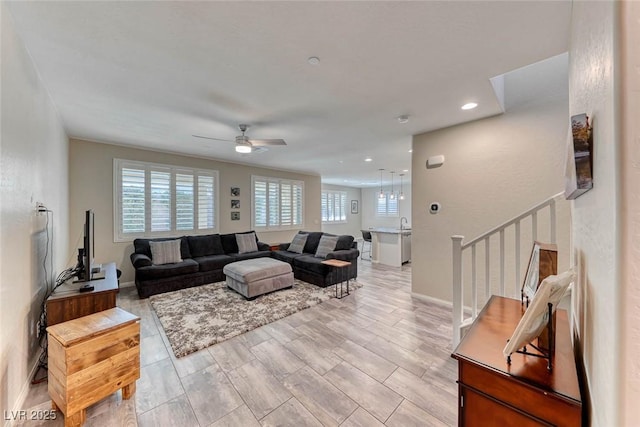 living room featuring ceiling fan