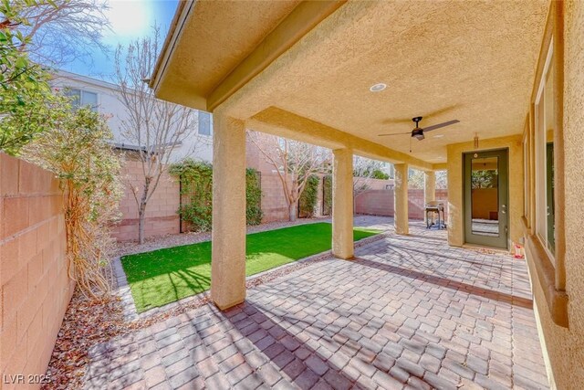 view of patio with ceiling fan