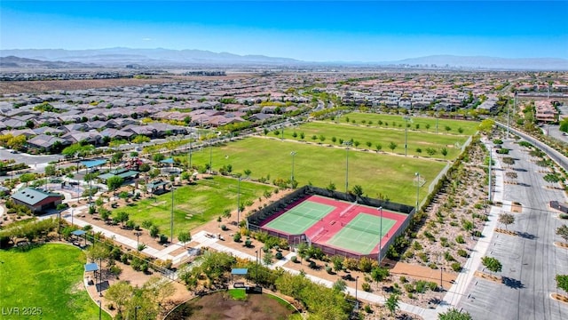 birds eye view of property featuring a mountain view