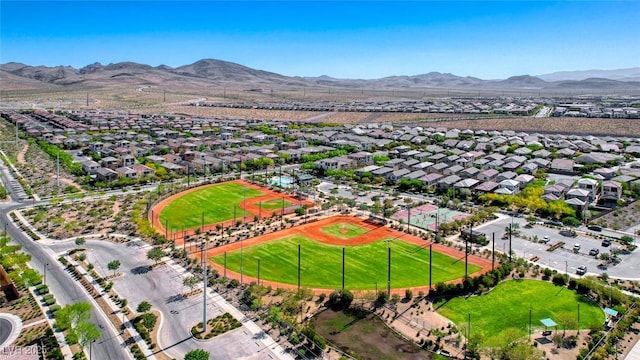 birds eye view of property featuring a mountain view