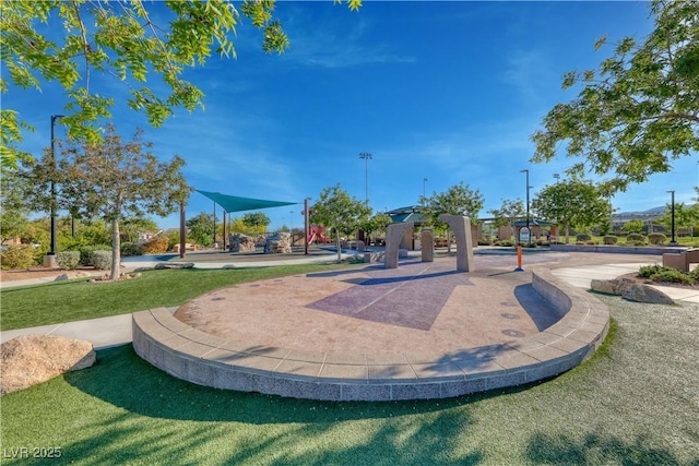 view of property's community featuring a lawn