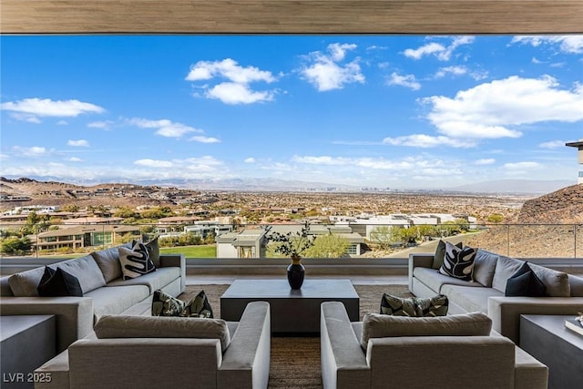 exterior space featuring an outdoor living space and a mountain view