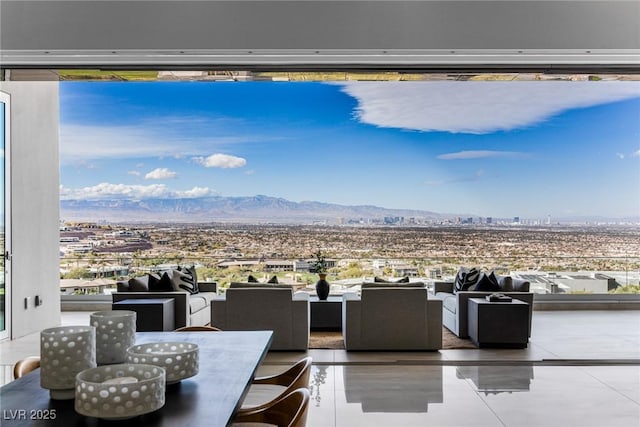 view of patio with a mountain view and an outdoor hangout area