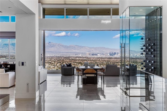 unfurnished dining area featuring a mountain view