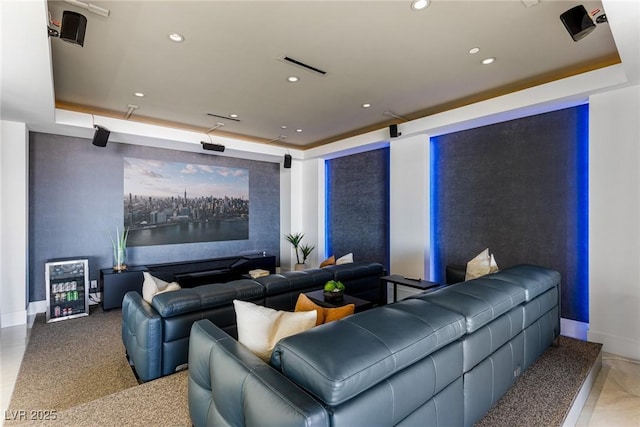 home theater featuring a raised ceiling