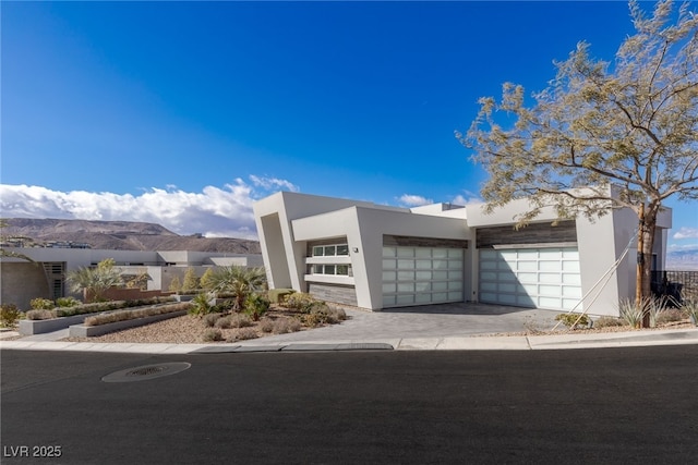 view of front of home with a mountain view