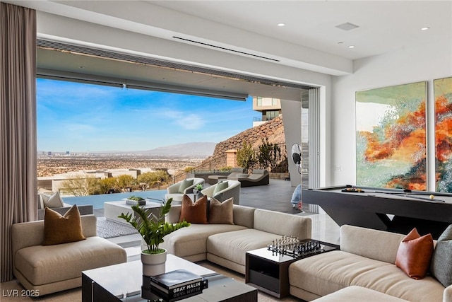 interior space with a mountain view and a wealth of natural light